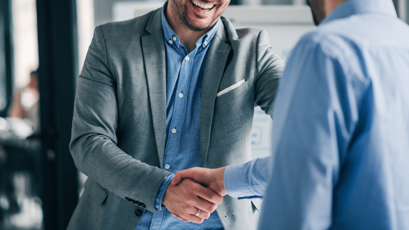 Colleagues shaking hands