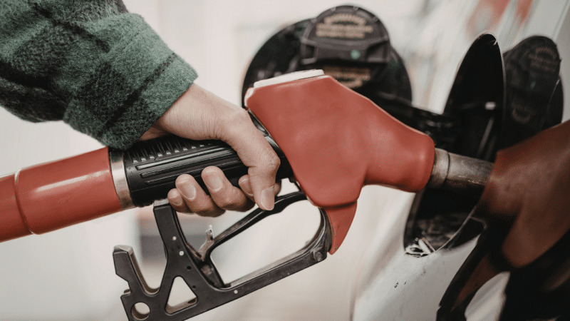 image shows fuel going into vehicle.