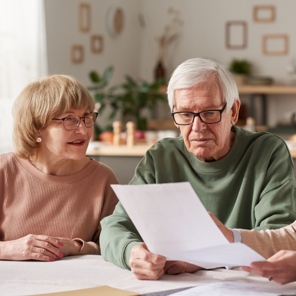 Image Shows: elderly couple signing wills