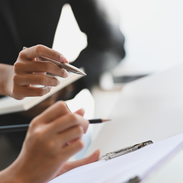 Image Shows: suggest signing papers