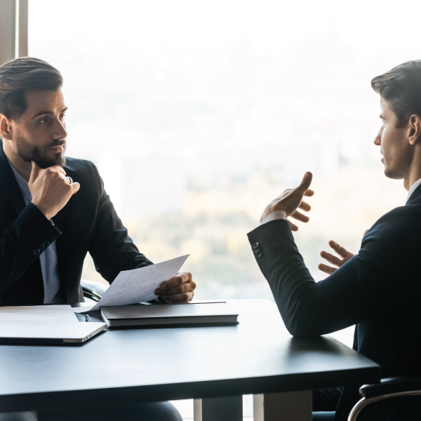 Image Shows: lawyer listening to client