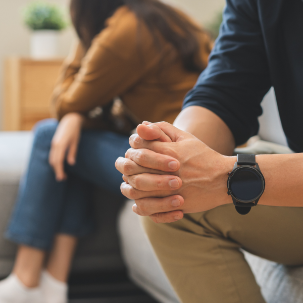 Image Shows: couple not speaking on the sofa