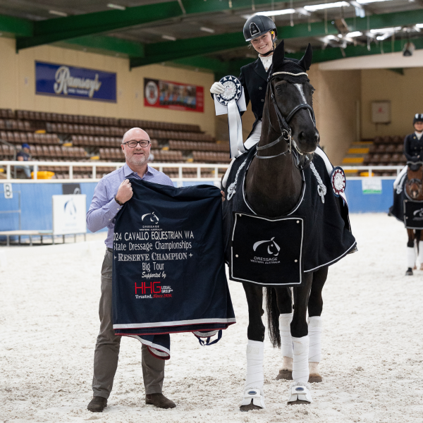 Image Shows: HHG Legal Group Managing Director Murray Thornhill presenting Rising Star