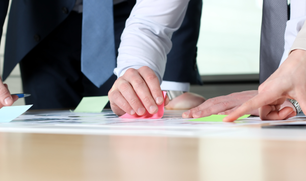 image shows people planning