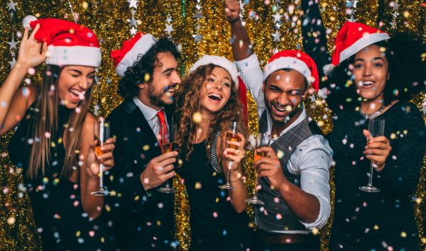 image shows employees having fun at Christmas party